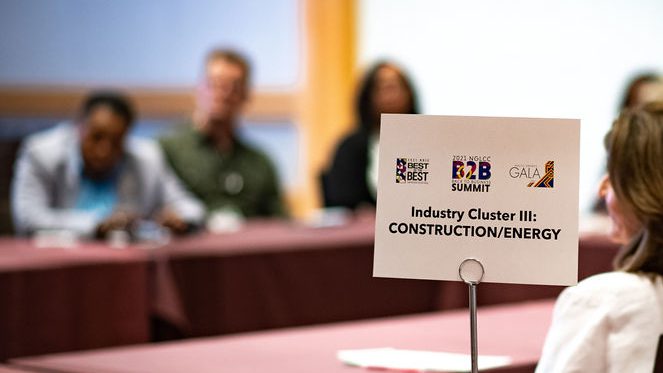 A close up image of a sign that states "Industry Cluser 3: construction/energy" at the NGLCC B2B summit
